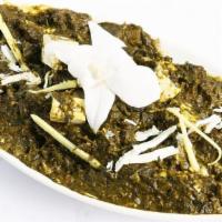 Palak Paneer · Spinach cooked with ginger, garlic, and cumin.