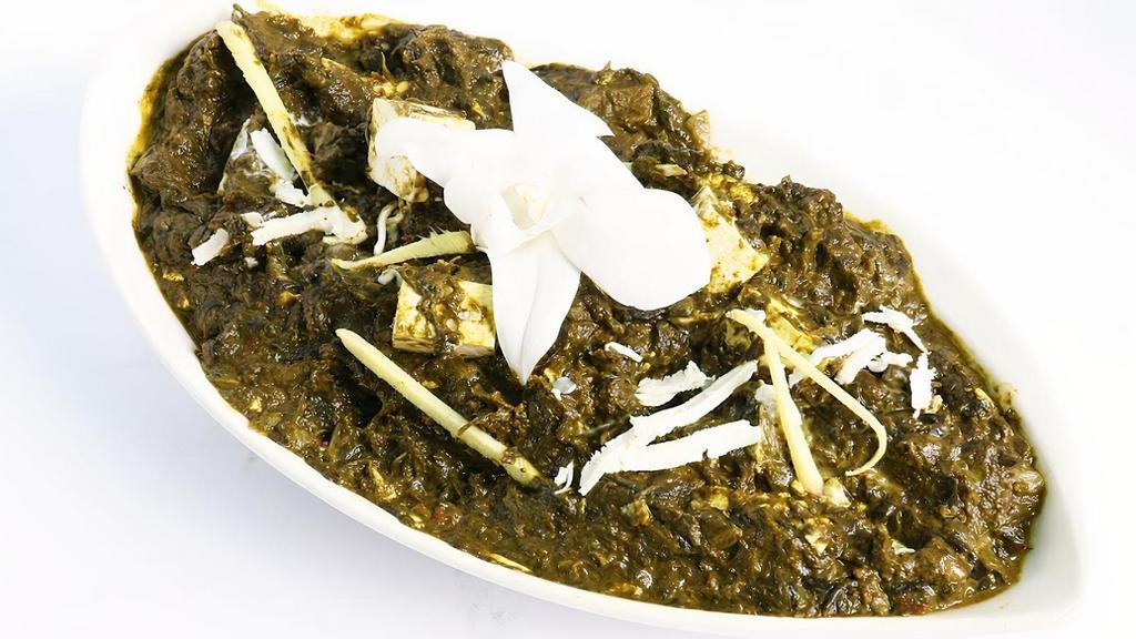 Palak Paneer · Spinach cooked with ginger, garlic, and cumin.