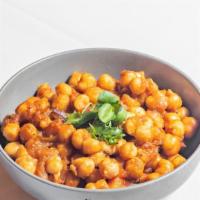 Chana Masala · Chickpeas cooked in tomatoes and onion.