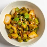 Bhindi Masala · Stir-fried okra with aromatic spices and tomatoes.