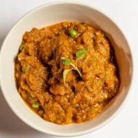 Baingan Bharta · Smoked eggplant mashed and cooked with tomatoes and onions.