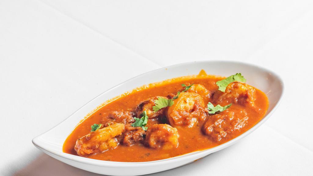 Shrimp Vindaloo · Spicy goan sauce with dry red chilies, garlic, and potatoes.