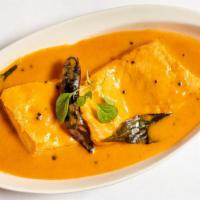 Goan Salmon Curry · Salmon cooked with tangy spices and coconut milk.
