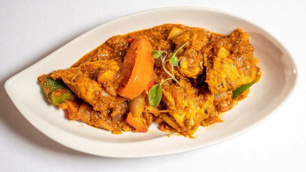 Kadai Chicken · Cooked with tomatoes, bell peppers, onions, and fenugreek.