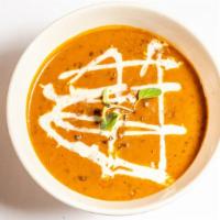 Daal Makhani · Three kinds of lentils, ginger, tomato, cream, and spices.