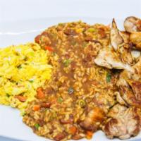 Desayuno Nueva Colombia 3 · Mixed rice and beans, Colombian style eggs and boneless chicken.