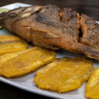 Mojarra · fried whole tilapia, rice, beans, plantain