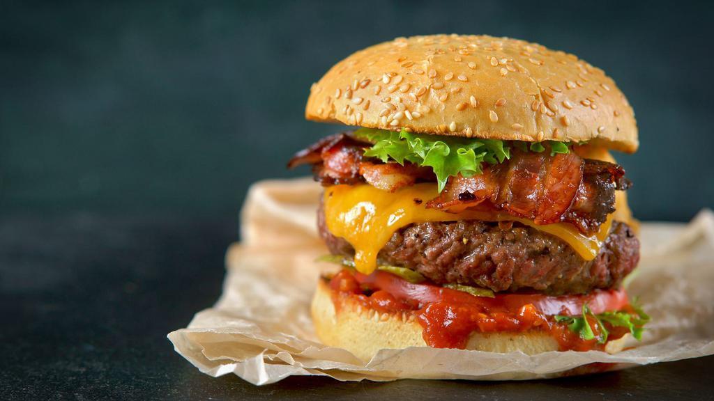 Cheesy Bbq Burger · Crave worthy burger decorated with cheese and BBQ Sauce.