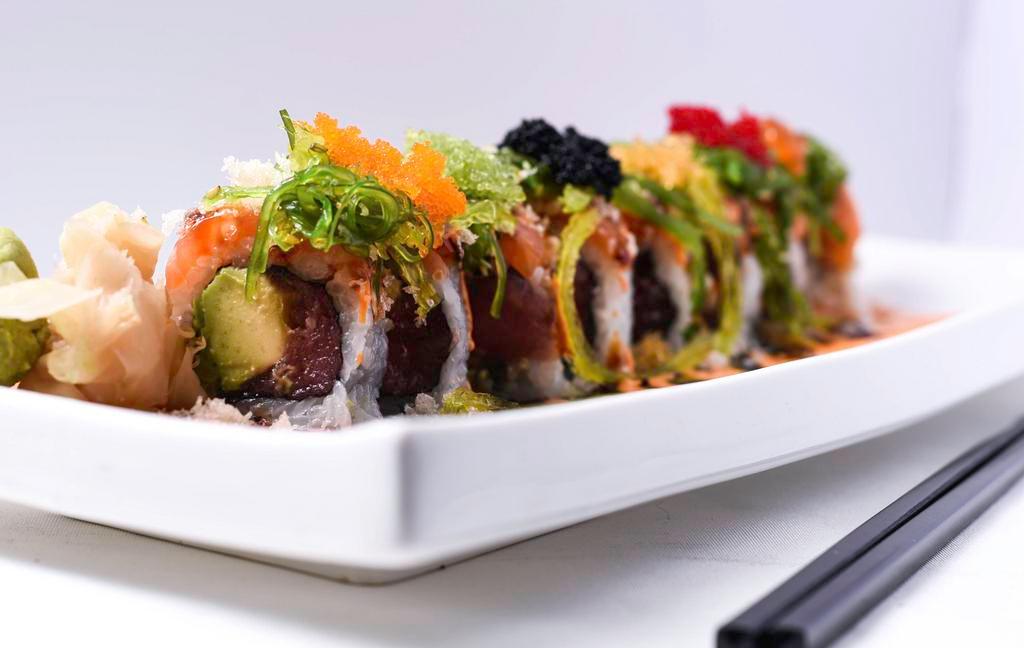 S&S Roll · Tuna, avocado, fresh salmon with five different kinds of caviar, seaweed salad tempura crunch, spicy mayonnaise, and eel sauce. Cut into 8 pieces.