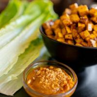Lettuce Wrap · Medium spicy - Minced chicken / tofu cube sauteed in lemongrass sauce, served with fresh let...