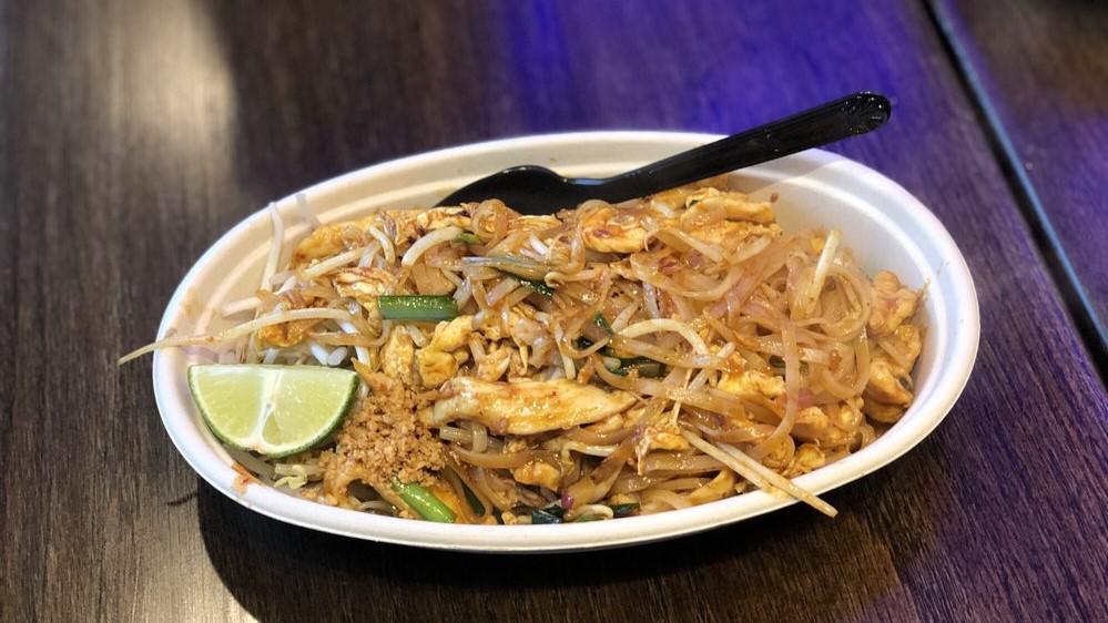 Pad Thai · Not Spicy - Thai famous thin flat rice noodles stir fried with egg, pickles, bean sprouts, onion, chives and crushed peanut