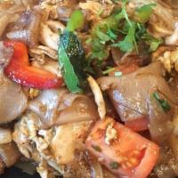 Pad Kee Mao · Medium Spicy - Stir-fry broad flat rice noodles with egg, basil, onion, bell peppers and tom...