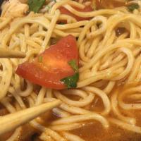 Tom Yum Noodle Soup · Medium Spicy - Egg noodle, snow pea, mushroom, tomato