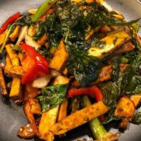 Wok Basil · Medium Spicy - Sauteed with basil, garlic, chili, bell pepper and onion in sweet and spicy s...
