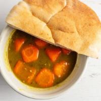 Lentil Soup · Healthy, Vegetarian Lentil Soup with Carrots Served with Half a Pita Bread on the side
16 FL...