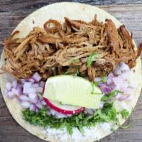 3 Carnitas Tacos · Roasted pork, cotija cheese, onion and cilantro on soft corn tortilla.