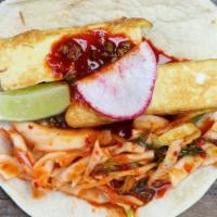 3 Tofu Tacos · Egg battered and pan fried tofu in sweet and spicy gochujang sauce, kimchi salad on flour to...