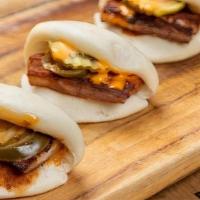 Pork Belly Bao Buns · Steamed, Pillowy Bao Buns Stuffed With Melt In Your Mouth Pork Belly, Pickled Cucumber, Jala...