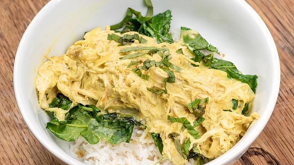 Chicken Curry · Slow Cooked Coconut Chicken, Green Curry Sauce, Spring Onions & Thai Basil Over Steamed White Rice.