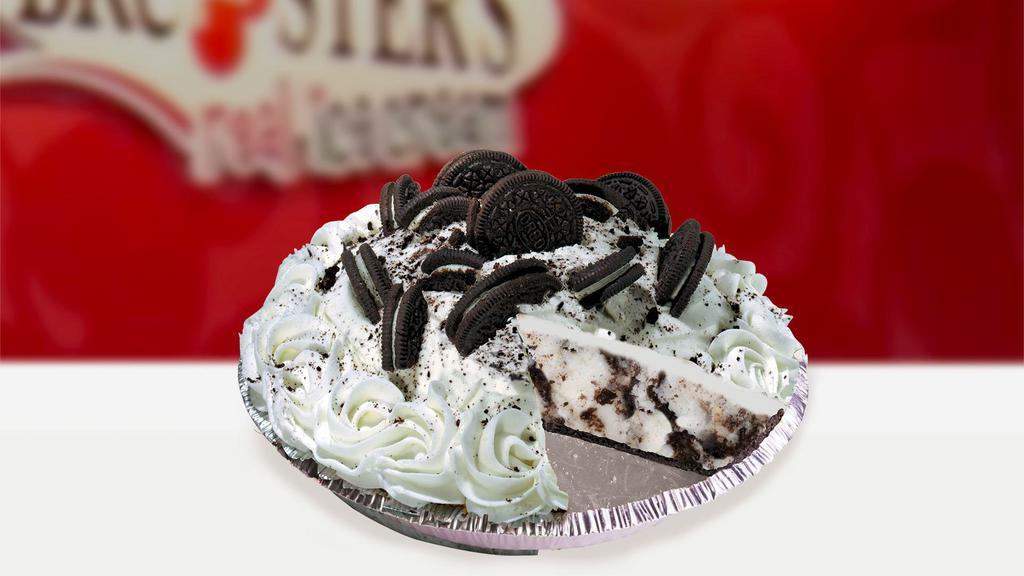 Oreo Ice Cream Pie · Oreo crust, topped with fudge, and filled with oreo ice cream.  Decorations may vary.