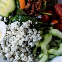 Cobb Salad · Bacon, Avocado, Egg, Bleu Cheese, Baby Spinach and Baby Kale Blend, Tomato, Carrots, Balsami...