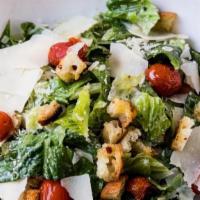Caesar Salad · Romaine, Blistered Tomatoes, Shaved Parmesan, House Made Croutons, Caesar Dressing.