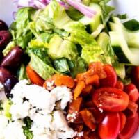 Greek Salad · Feta, olives, red onion, cherry tomato, romaine, cucumber, red peppers, oregano vinaigrette.