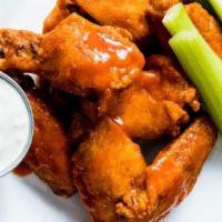 1/2 Dozen Wings · Your choice of wing sauce. Served with Bleu Cheese Dressing and Celery.