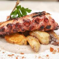 Grilled Spanish Octopus · Roasted fingerling potatoes, Salsa Tonnata and caper berries.
