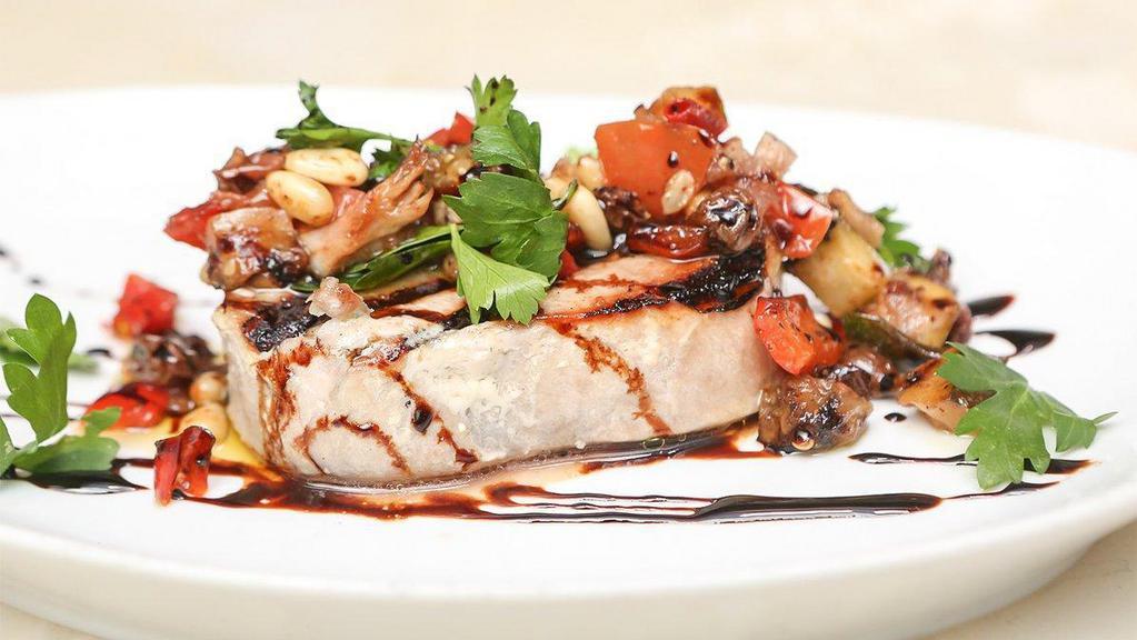 Grilled Tuna Steak · Served with mixed vegetable caponata and balsamic glaze.