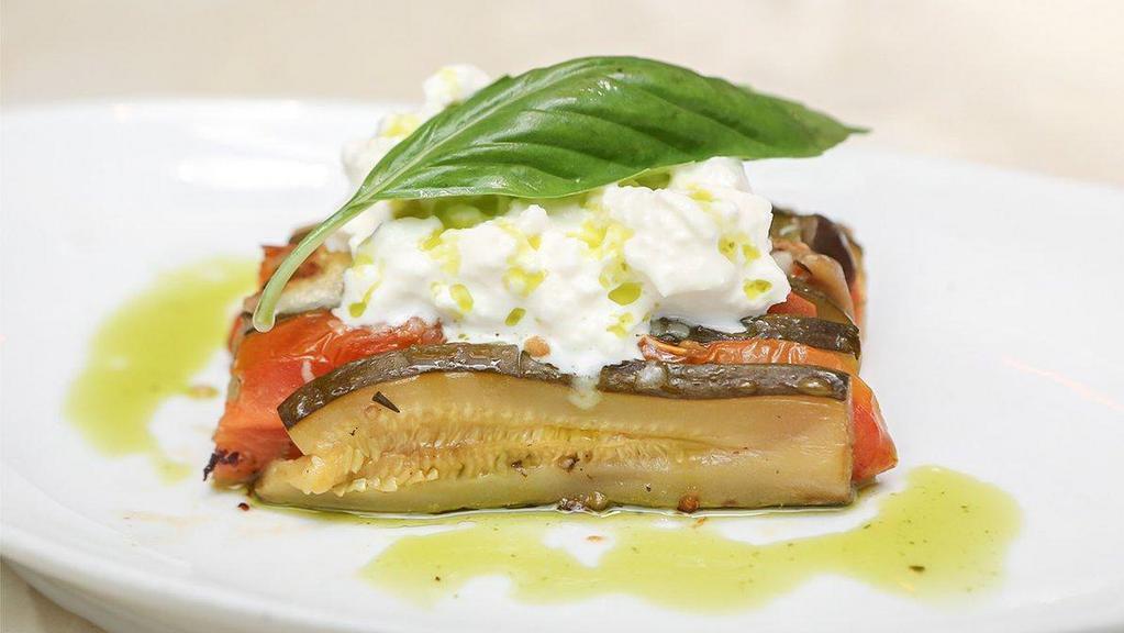 Baked Vegetable Ratatouille · Zucchini, eggplant, tomato, burrata flakes and basil infused EVOO.