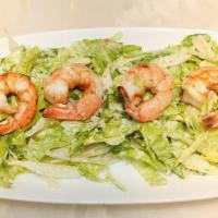 Shrimp Ceaser  Salad · Romaine hearts, croutons and 4 grilled shrimps.