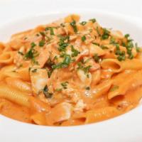 Garganelli With Lobster Bisque · Minced lobster meat in a creamy bisque with fresh chives