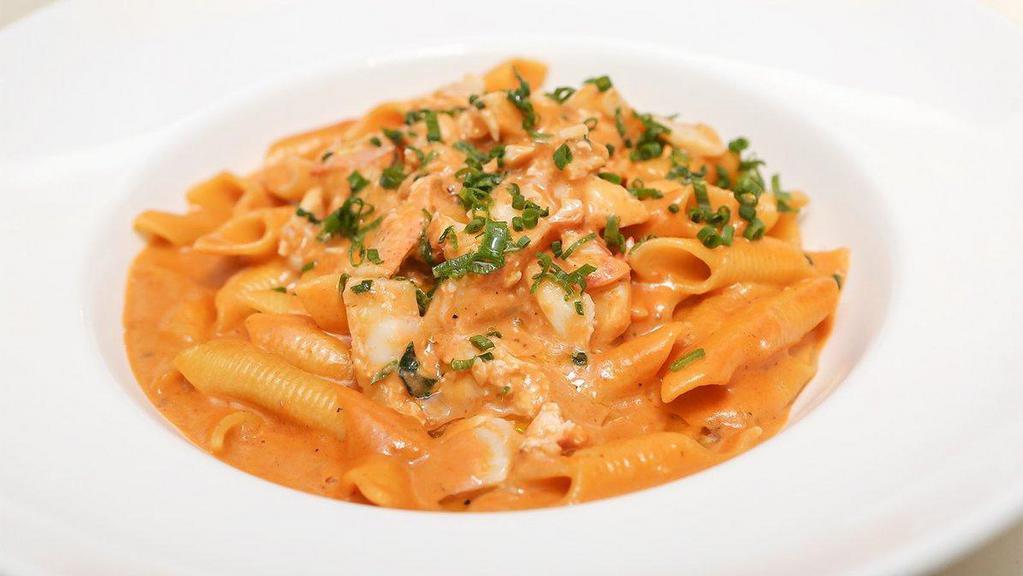 Garganelli With Lobster Bisque · Minced lobster meat in a creamy bisque with fresh chives