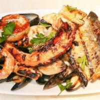 Mixed Grilled Seafood (For Two Or More) · Scallops, shrimps, branzino fillet, calamari, salmon, octopus with mussels and clams.