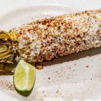 Elote (Mexican Street Corn) · Enjoy this delicious classic Mexican street food!  Corn on the Cob topped with mayo, lime, s...