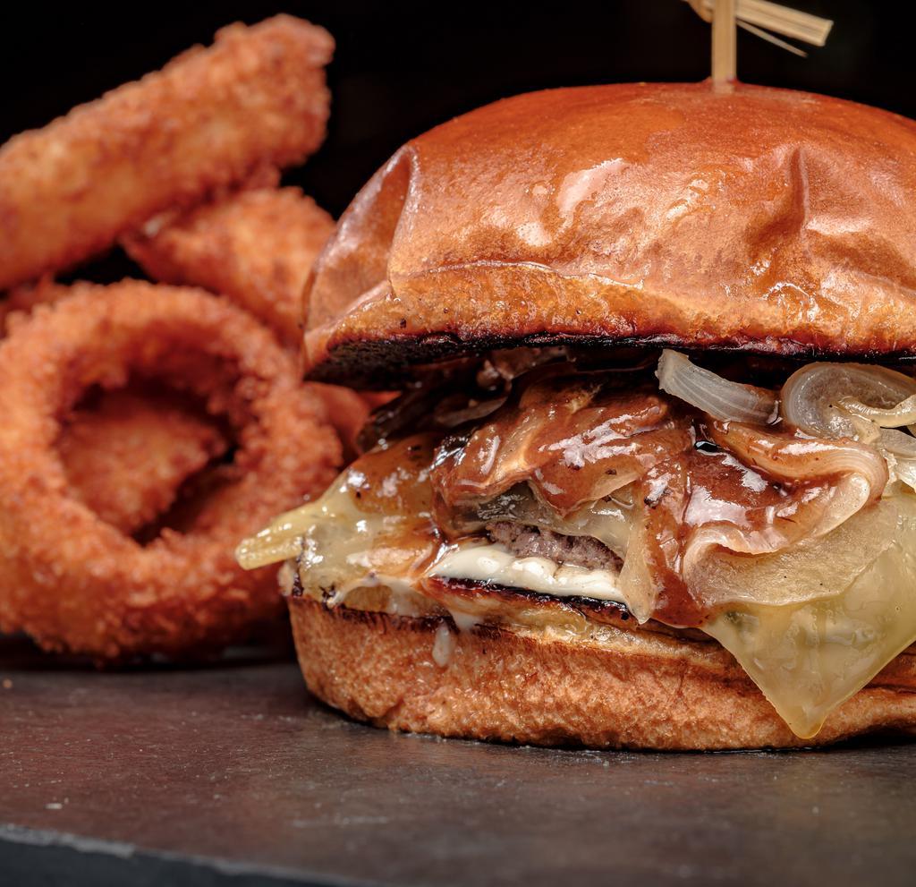 Mushroom & Onion  Burger · Topped with grilled mushrooms & onions, swiss cheese, and garlic mayo on a brioche bun