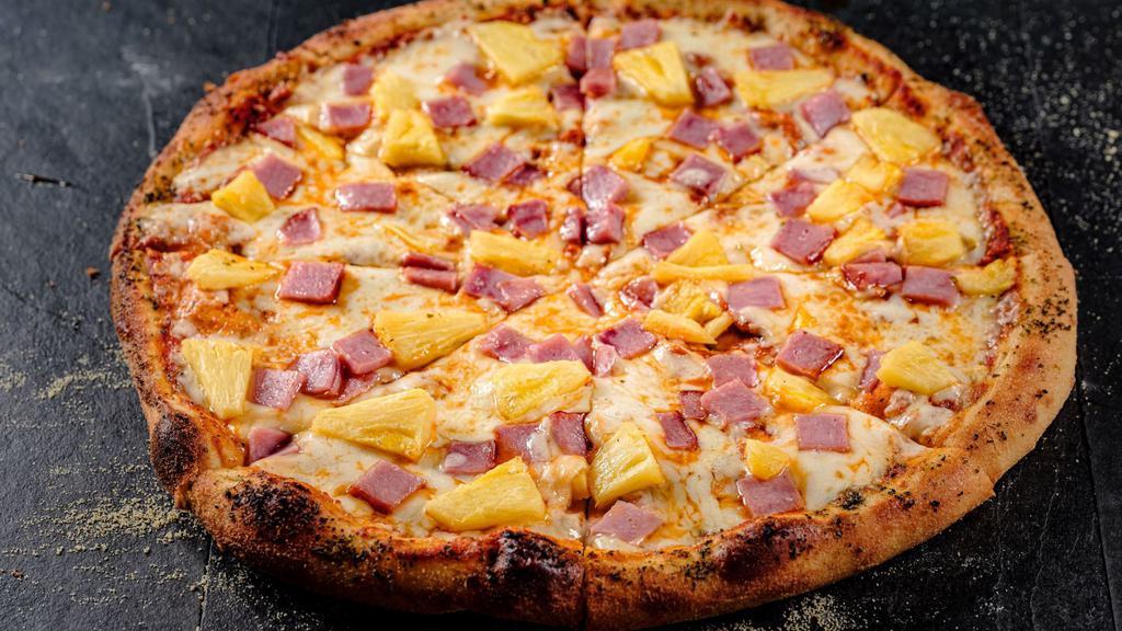Hawaiian · An island classic with house cheese blend, canadian bacon, local
pineapple, and traditional red marinara sauce