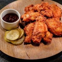 Chicken Wings · Lightly breaded and slightly spicy....... Delicioso! 
8 pieces