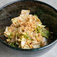 Addictive Spicy Cabbage Cabbage · Spicy. Charred peanuts and crispy onion.