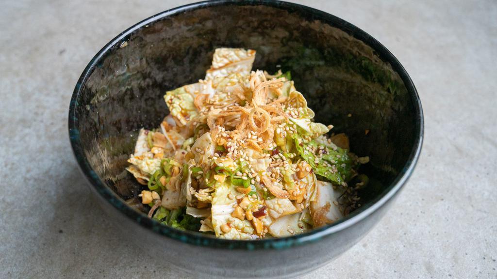 Addictive Spicy Cabbage Cabbage · Spicy. Charred peanuts and crispy onion.