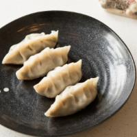 Seared Mushroom & Edamame Dumplings (4) · served with sweet soy sauce