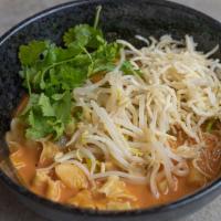 Malaysian Noodles With Chicken · Bean sprouts and cilantro in coconut curry broth.