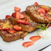 French Toast · Special French brioche toast, served with fresh fruit and maple syrup.