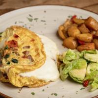 Italian Omelet · 3 fresh eggs omelet filled with Italian Sausage, tomato, fresh basil, mozzarella cheese.