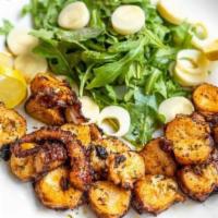 Grilled Octopus  · Chargrilled marinated Mediterranean octopus.Sliced & sauteed with fresh herbs.Served with ba...