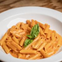 Penne Alla Vodka · Penne pasta perfectly blended with creamy tomato vodka sauce.