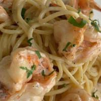 Shrimp Fettuccine Alfredo · Fettuccine pasta blended with classic Alfredo sauce  &  jumbo shrimp