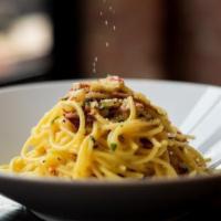 Spaghetti Carbonara · Spaghetti pasta with sautéed shallots, bacon, egg, and Parmesan cheese in creamy sauce