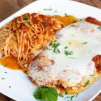 Chicken Parmigiana · Hand-breaded crispy chicken breast topped with made-fresh daily tomato sauce and melted mozz...